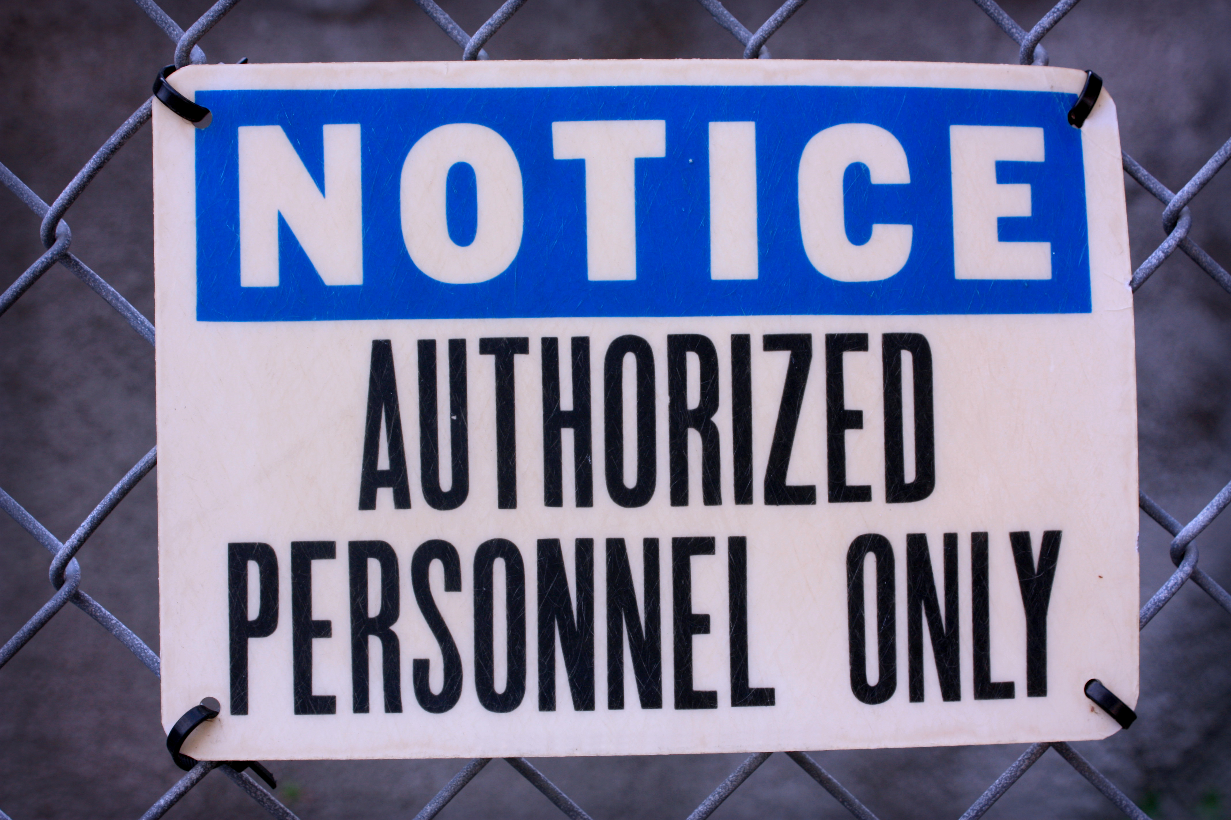 Photo of a sign that reads: "Notice: Authorized Personnel Only"