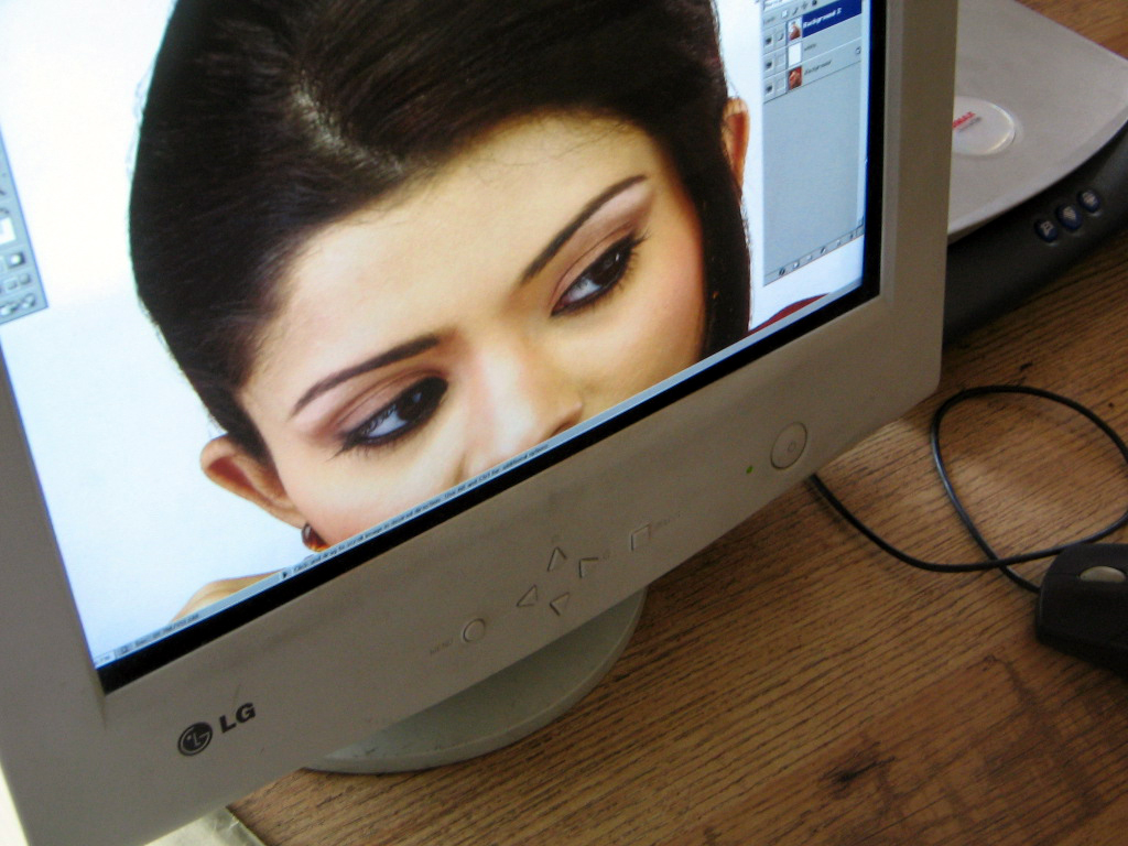 Photo of face on a computer screen