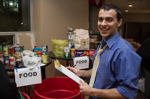 photo of volunteer at food and clothing drive