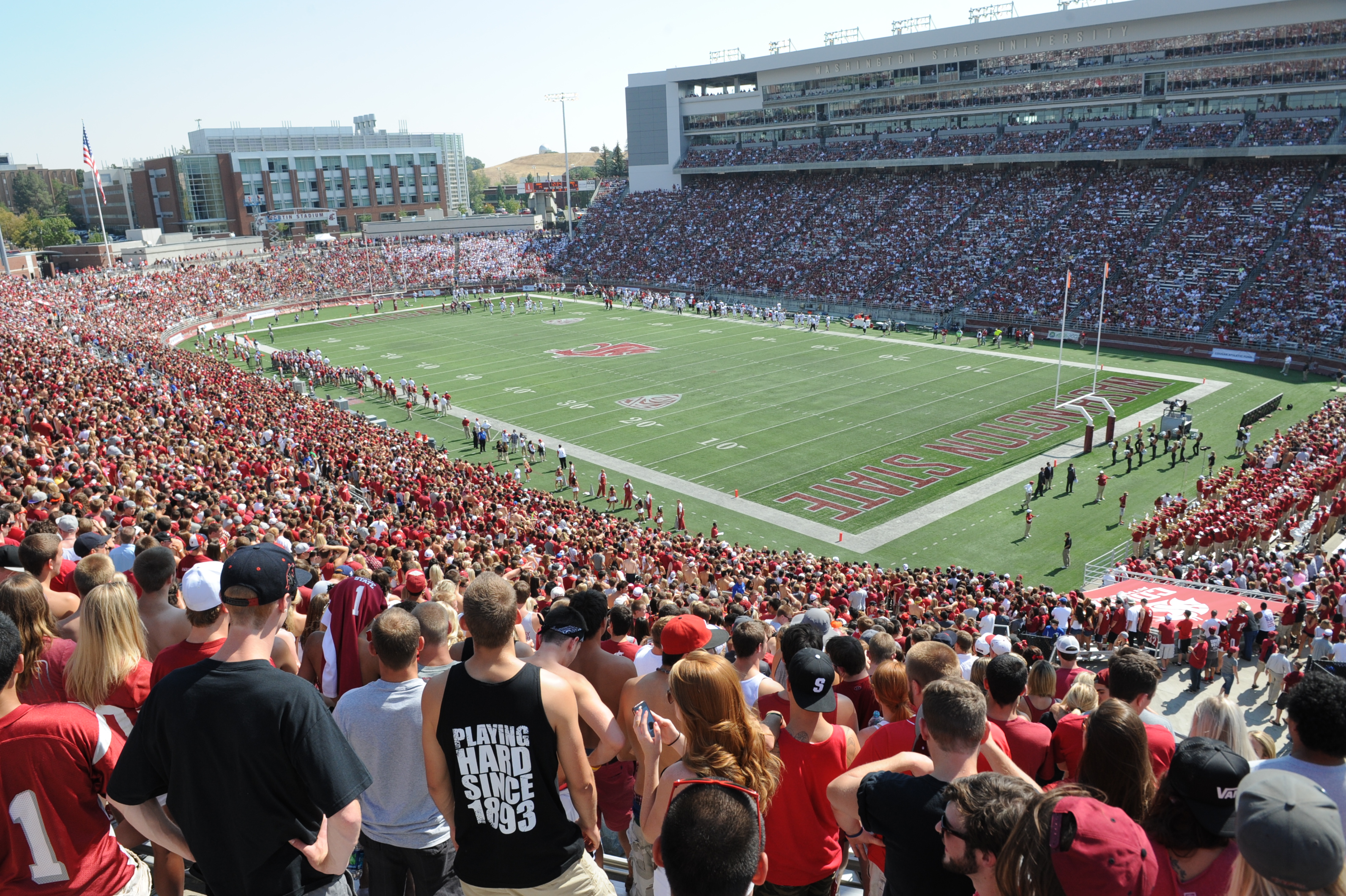 Phot of students at a football game in WSU's stadium