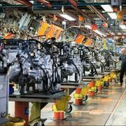 Photo of automobile engine assembly line.