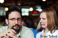 Photo of a man looking confused and a woman making a face of disbelief