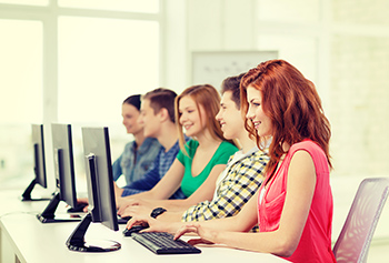 young students at computers