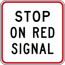 Warning sign reading: "Stop on Red Signal"