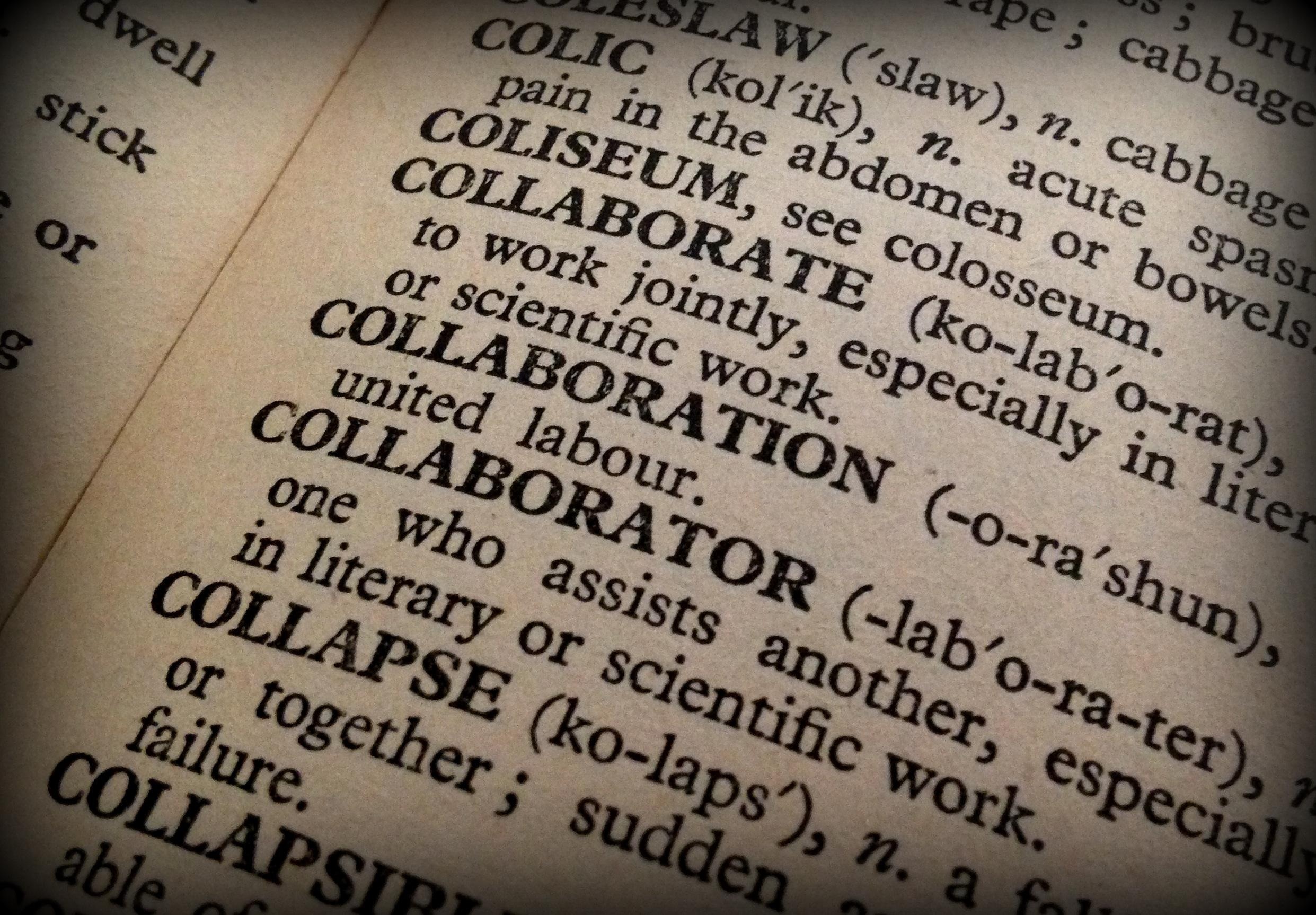 Close up of a dictionary entry for collaborate (to work jointly, especially in literary or scientific work), collaboration (united labour), and collaborator (one who assists another).