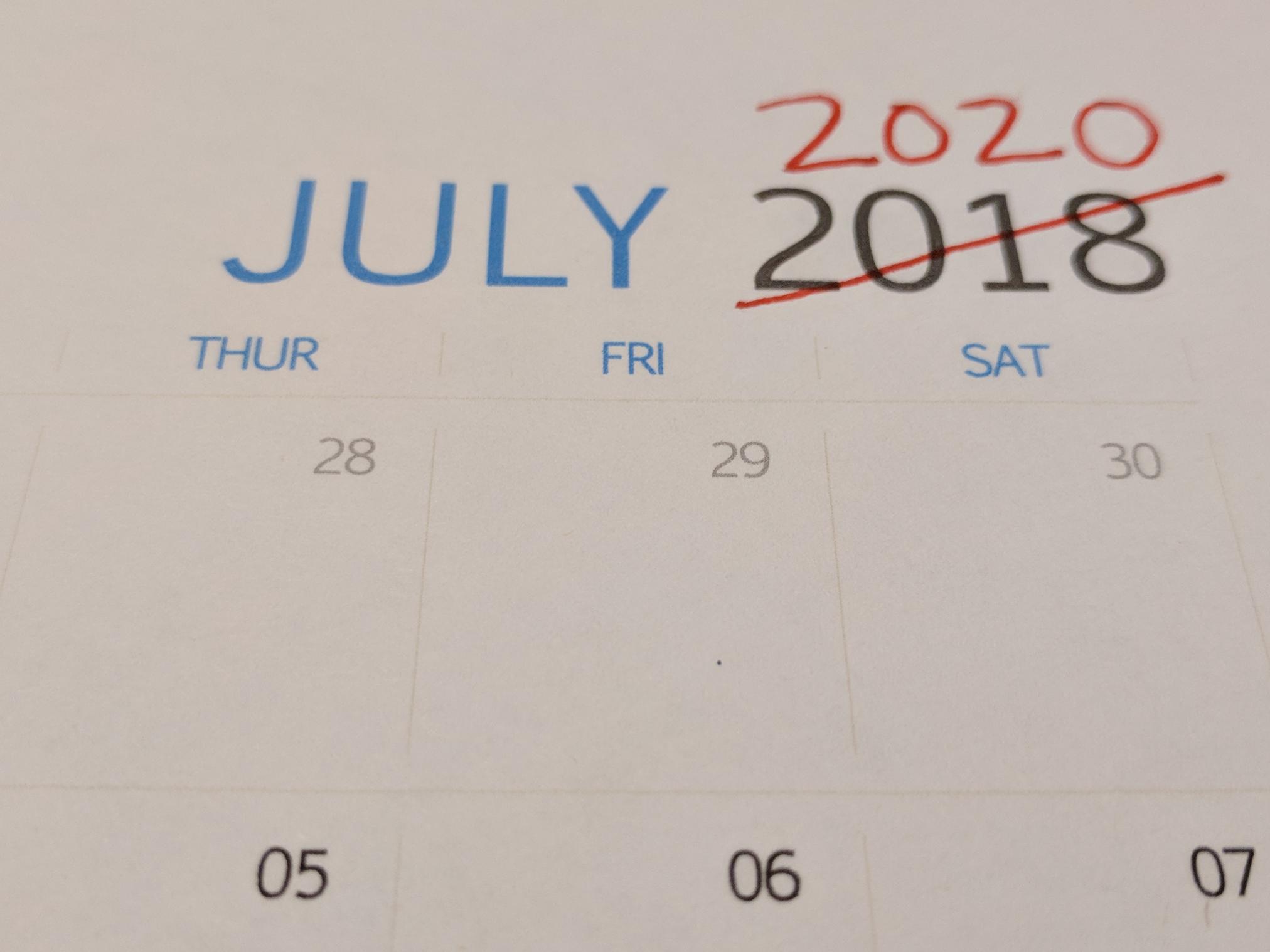 jULY 2018 Calendar with 2018 crossed out and 2020 written in