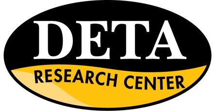 DETA Logo. An oval with black on top and yellow on bottom of logo. At the top the logo reads DETA, underneath it reads Research Center