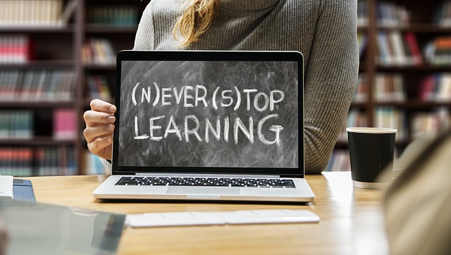 Picture of a laptop computer screen that reads, "Never Stop Learning."