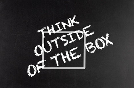 the words "think outisde of the box" written outside of a hand drawn box