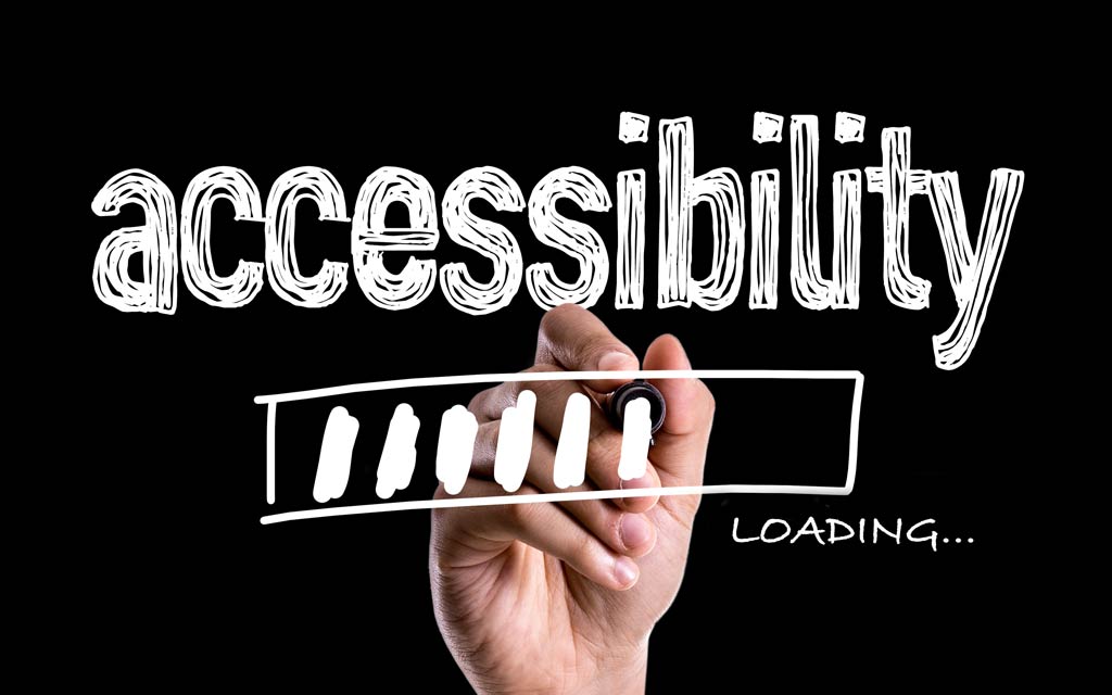 chalkboard style writing on glass that says Accessibility