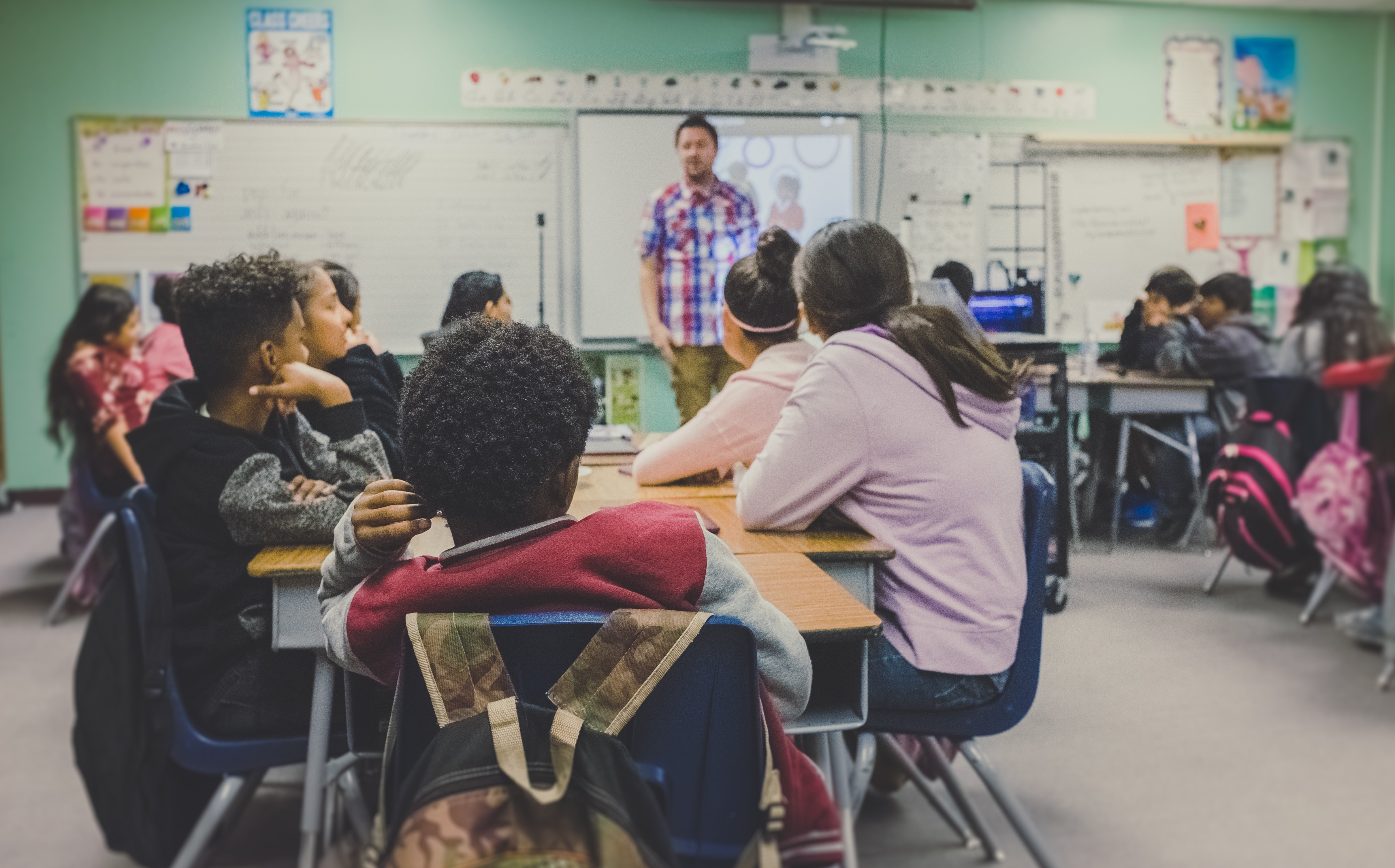 Teacher in front of a classroom of students