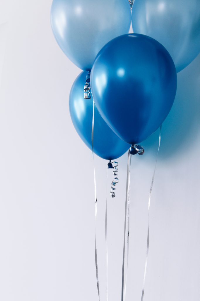 several baloons on strings