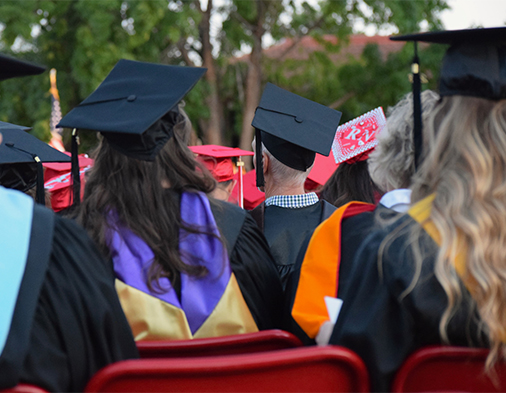 New graduates at a graduation ceremony.