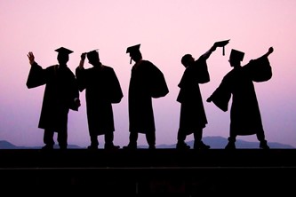silhouette of graduating students