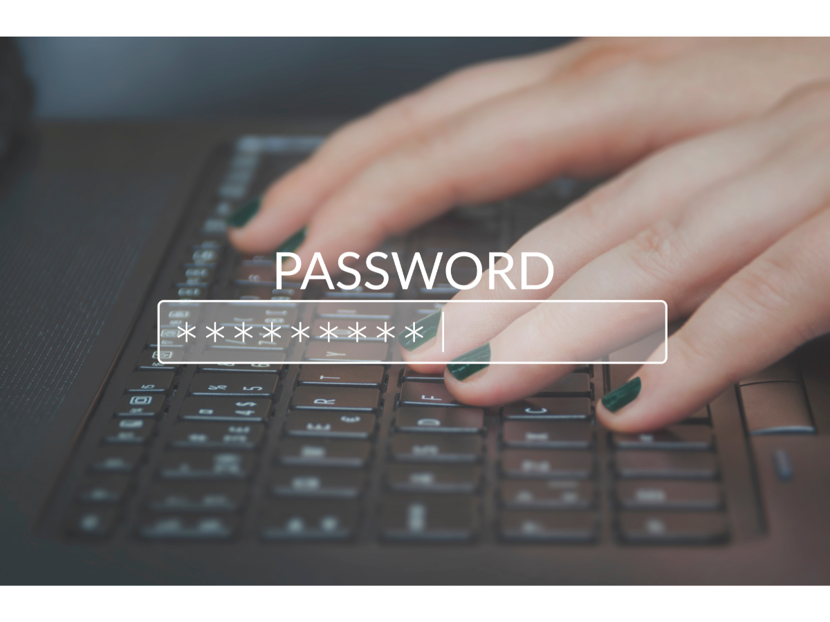 image of someone typing on a keybord with the word "password" overlaid on top of the image and a field representing a password