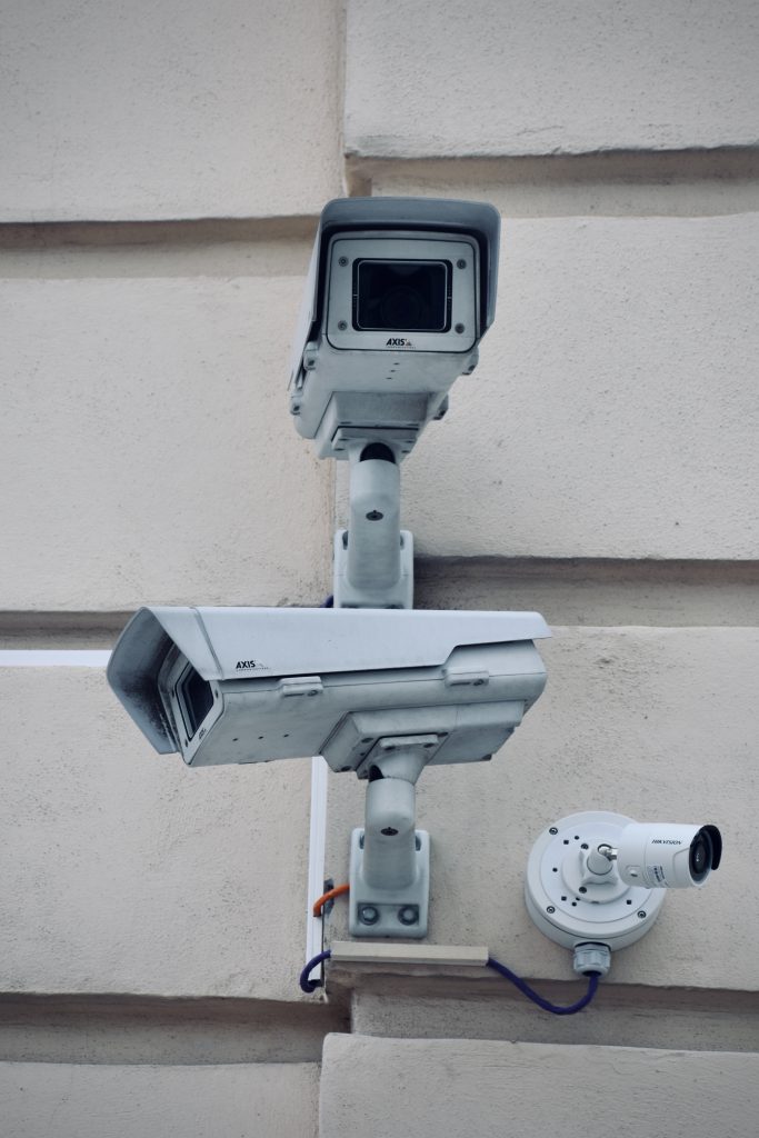 Three security cameras on a building.