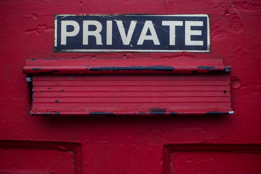 "PRIVATE" sign on a door.