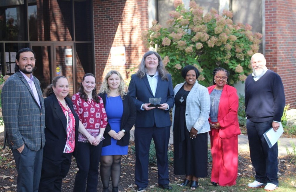 Photo - Members of the Post University team from left to right) Alex Larsson, Accreditation      Specialist; Melissa Pilloise, Accreditation Specialist; Christine Adamczyk, Accreditation Specialist; Michelle Hubbell, Director of Military and Graduate Admissions; Shawn Fields, Associate Director of Accreditation; Jana Walser-Smith (State Authorization Network); Sandra Wilson, Co-Provost; Jeremi Bauer, Co-Provost.