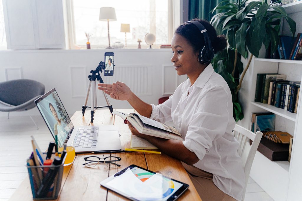 A woman using a video conference platform.