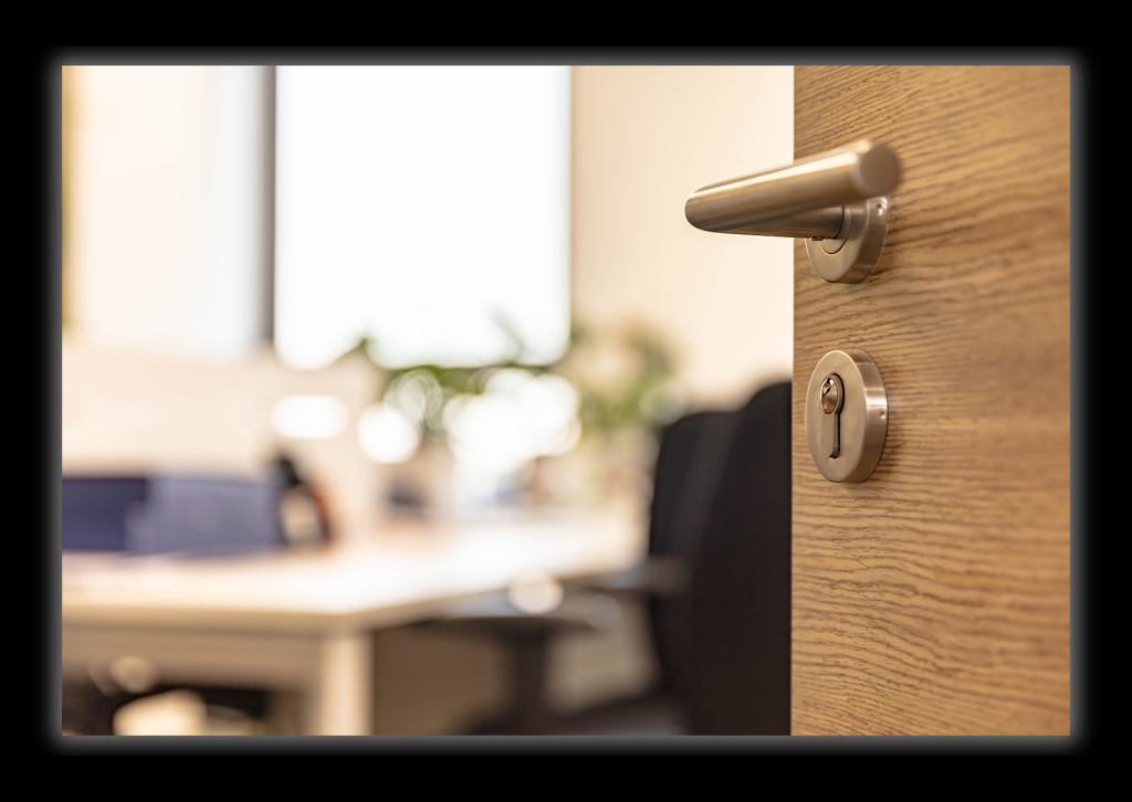 image of an open door leading into an office