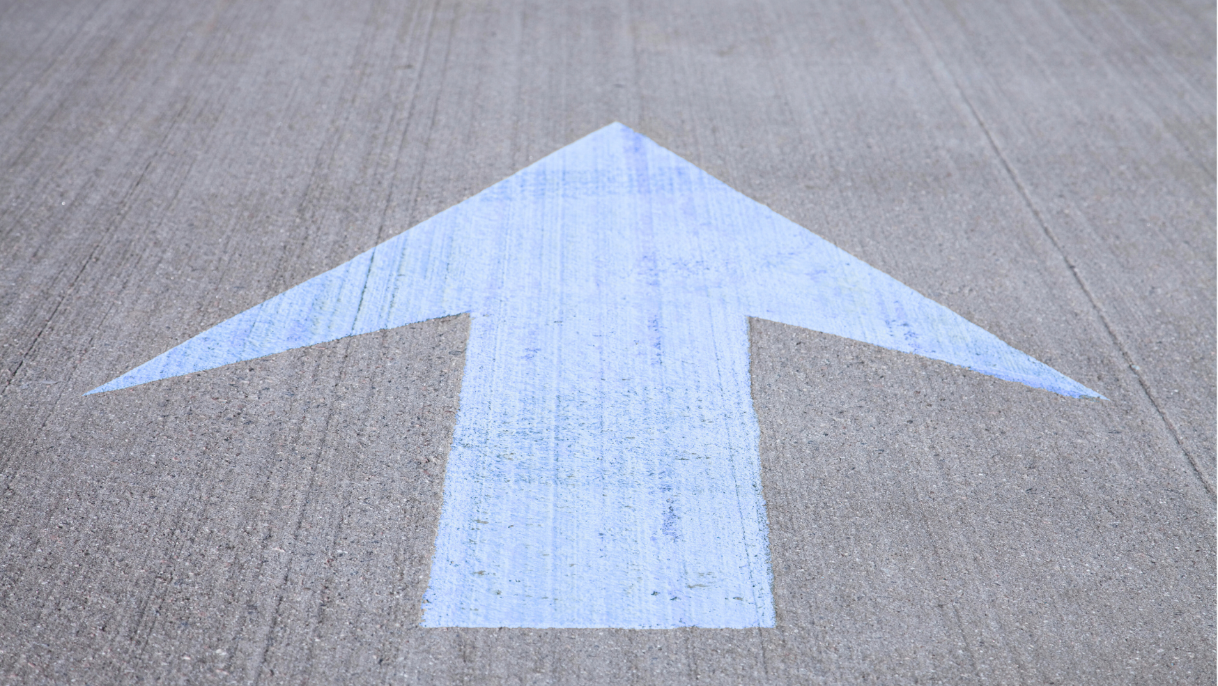 A blue arrow pointing forward